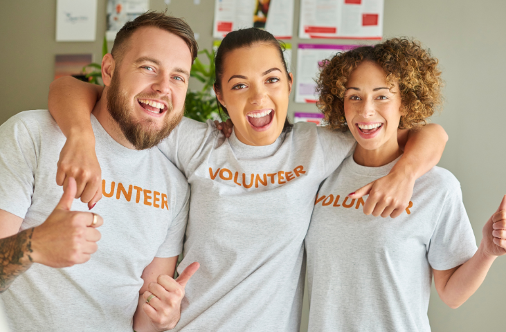 Image of three volunteers working