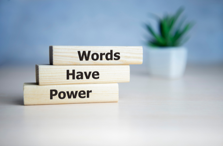 A graphic that are words on blocks that say Words Have Power