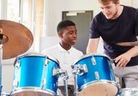 Boy playing drums