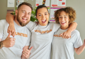 Image of three volunteers working